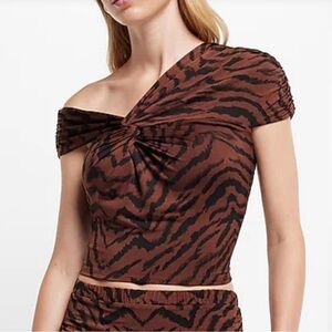 Express Body Contour Brown and Black Zebra Print Crop Top
Size M